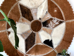 Vintage handmade cowhide rug