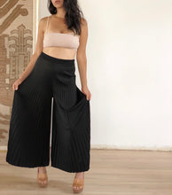 pleated trousers